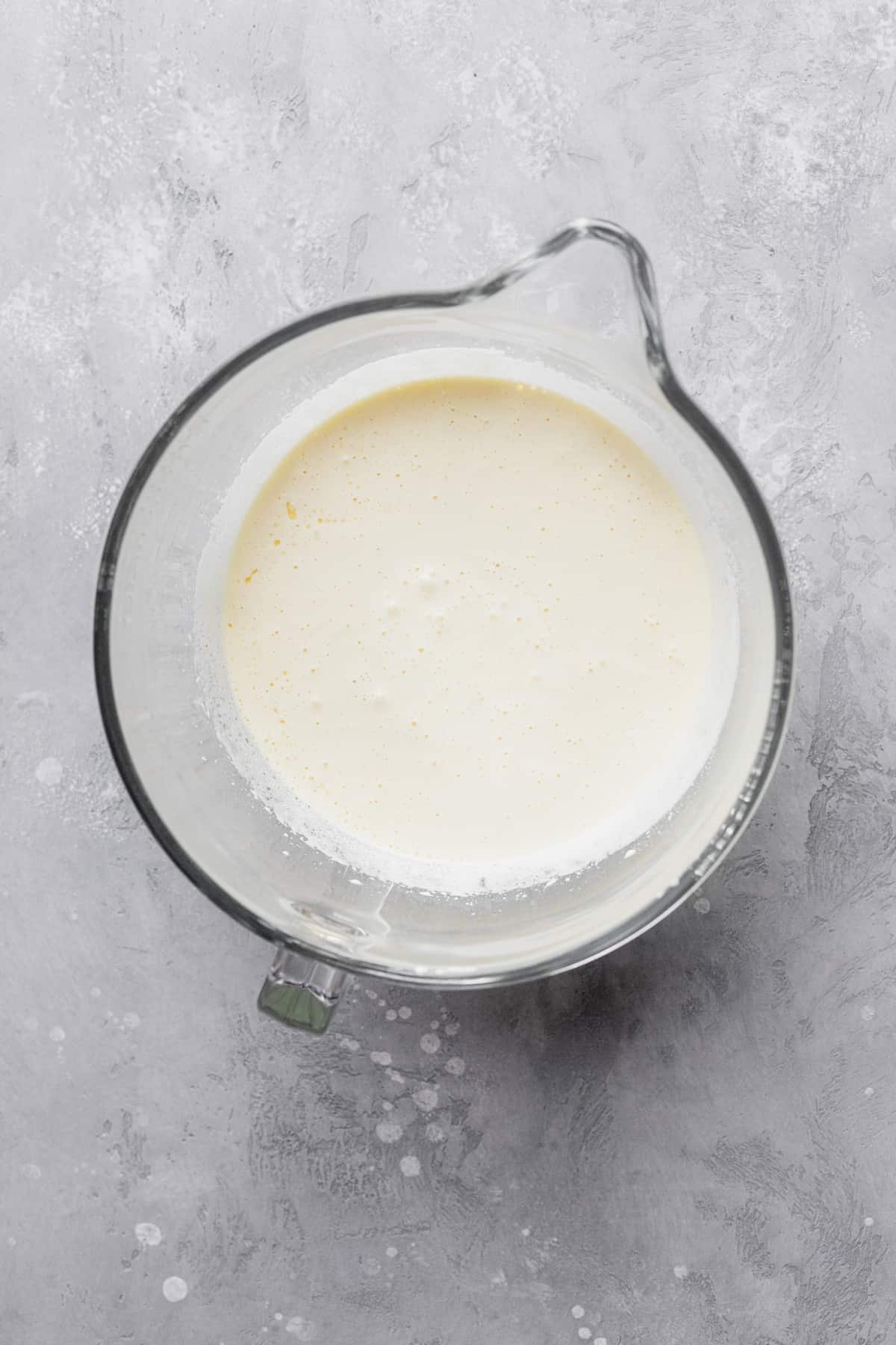 Whipped sugar in a glass bowl.