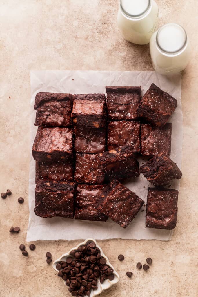 Cut brownies on a parchment paper.
