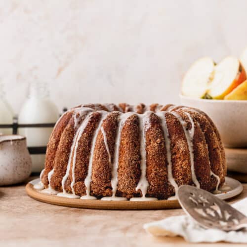 Apple cider donut cake on a plate.