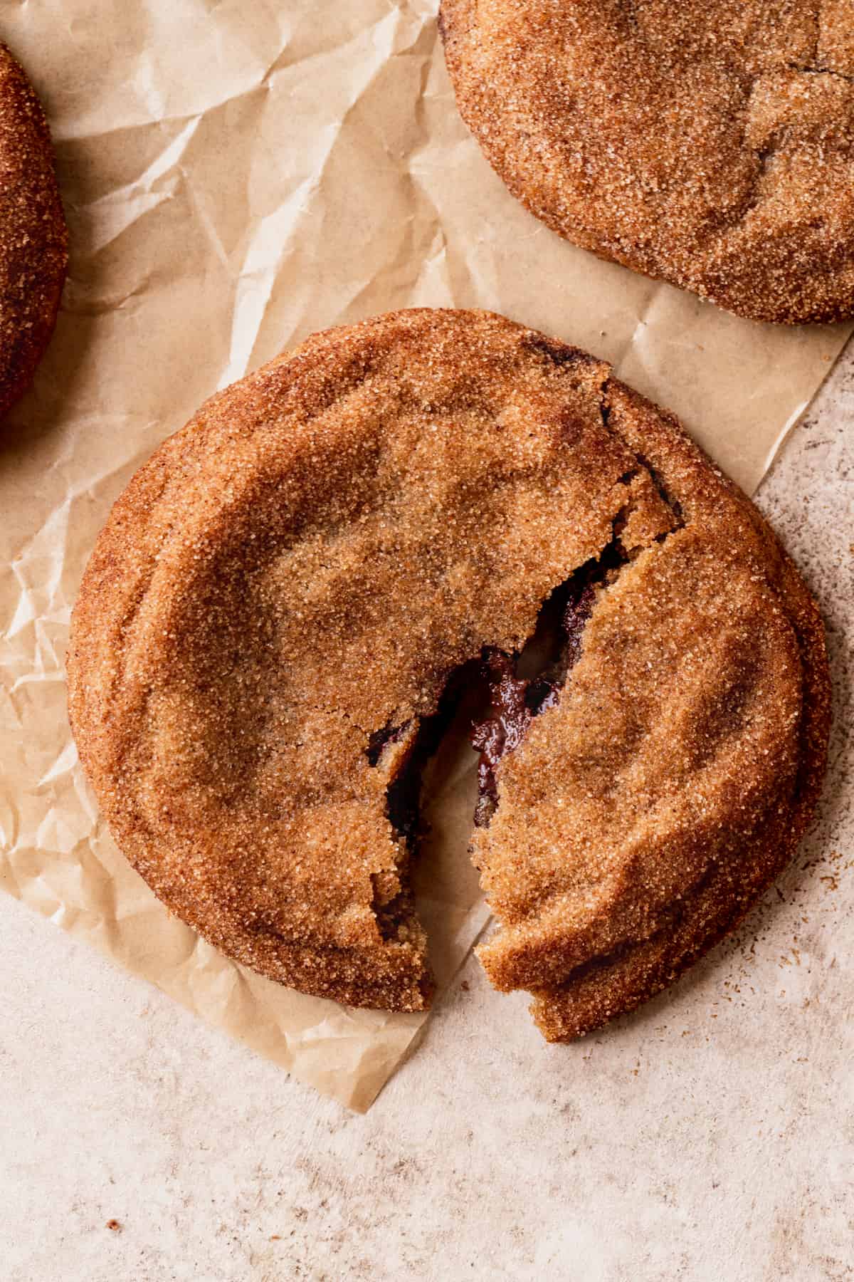 Churro chocolate stuffed cookies split in half.