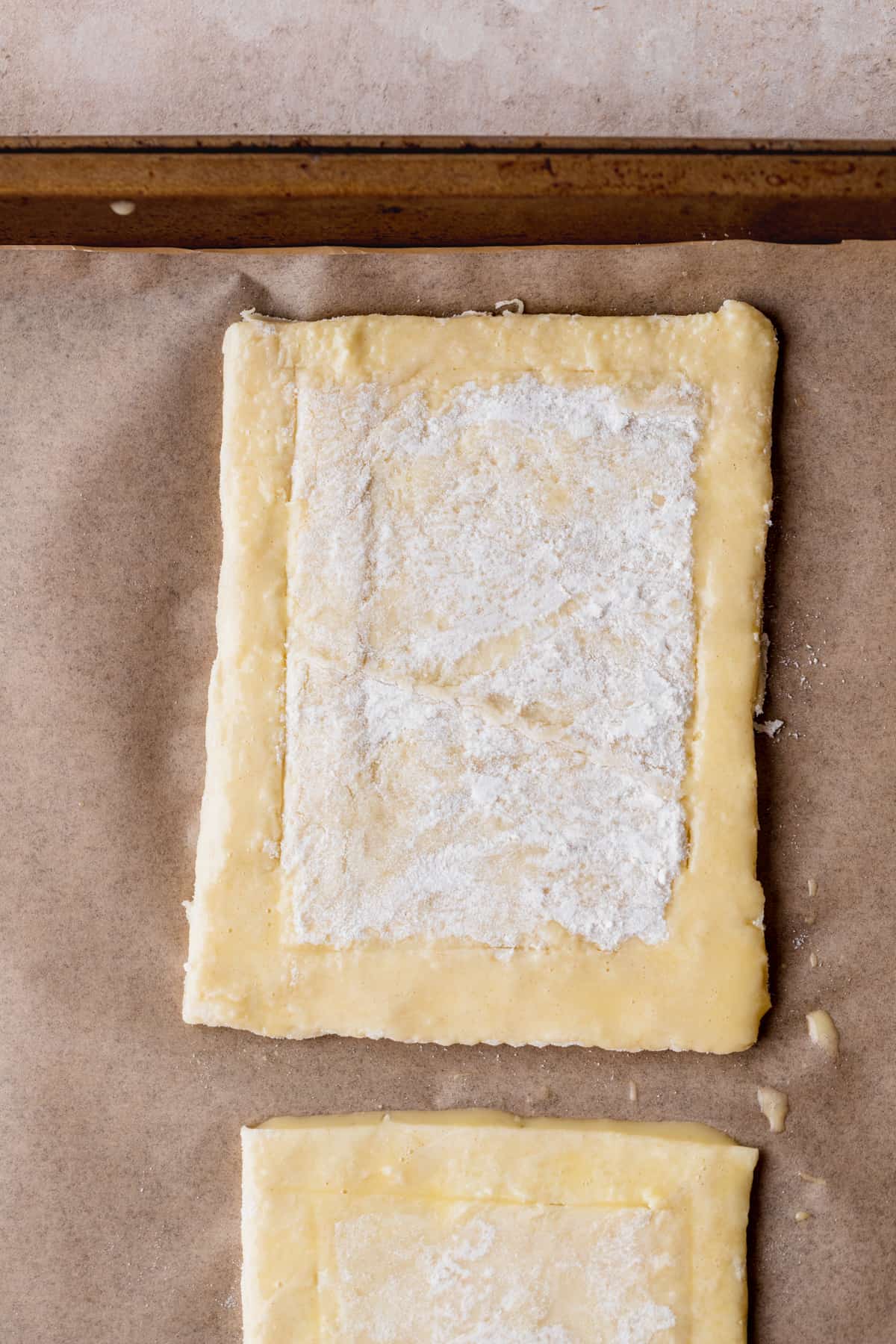 Puff pastry on a cookie sheet,