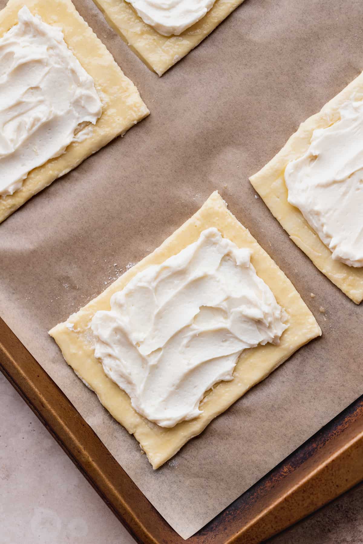 Cream cheese on top of pastry.