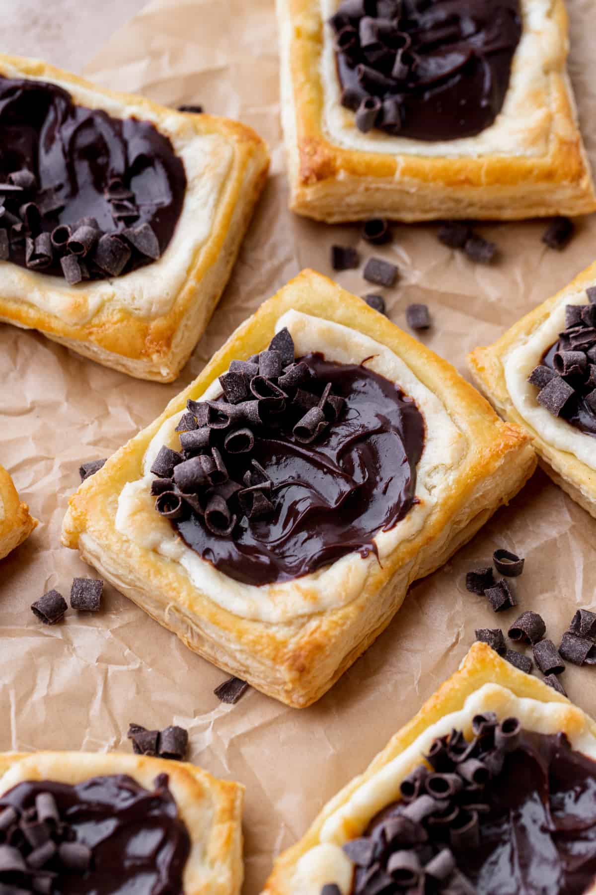 Chocolate cream cheese danish on a parchment paper.