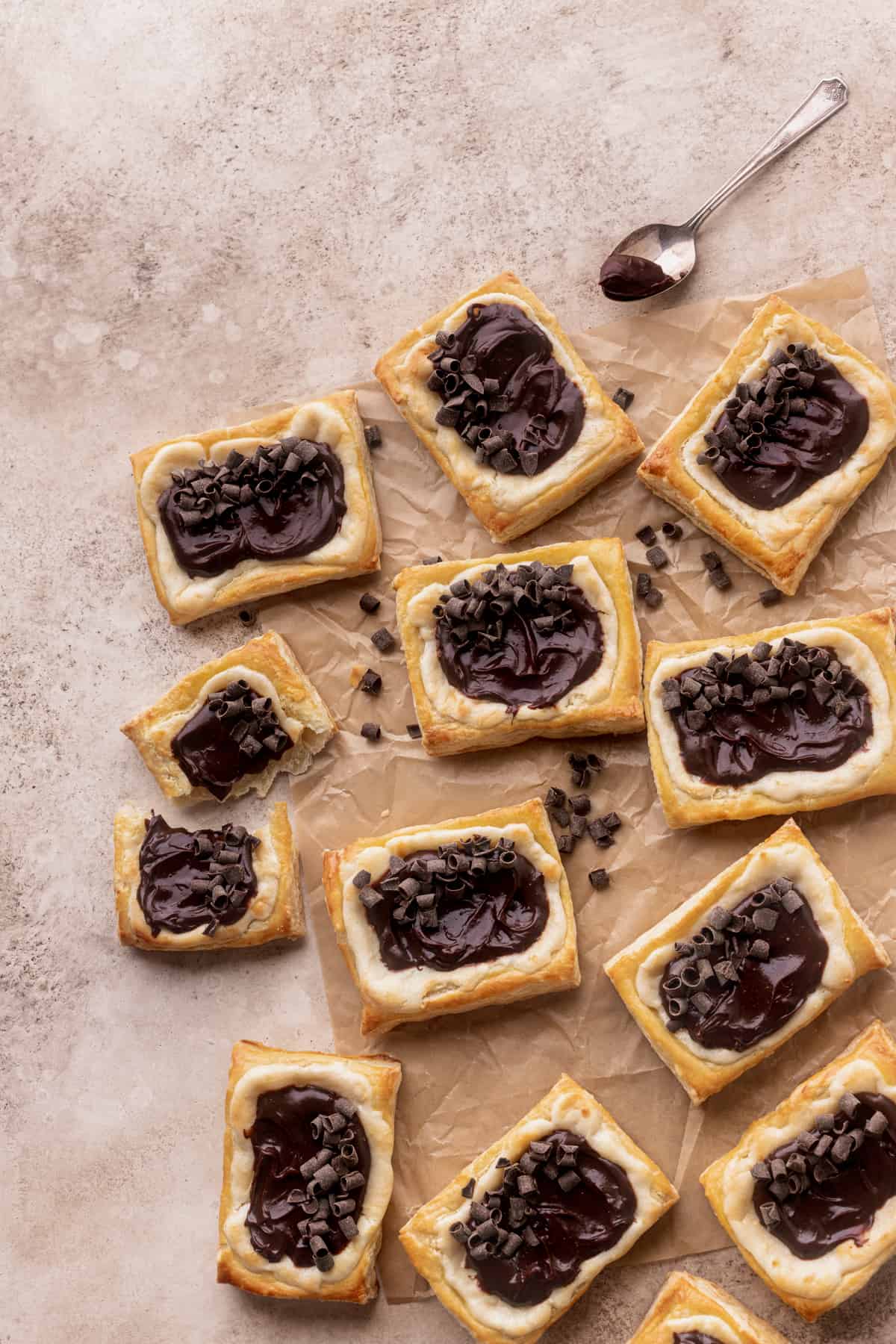 Spread of danishes on parchment paper.