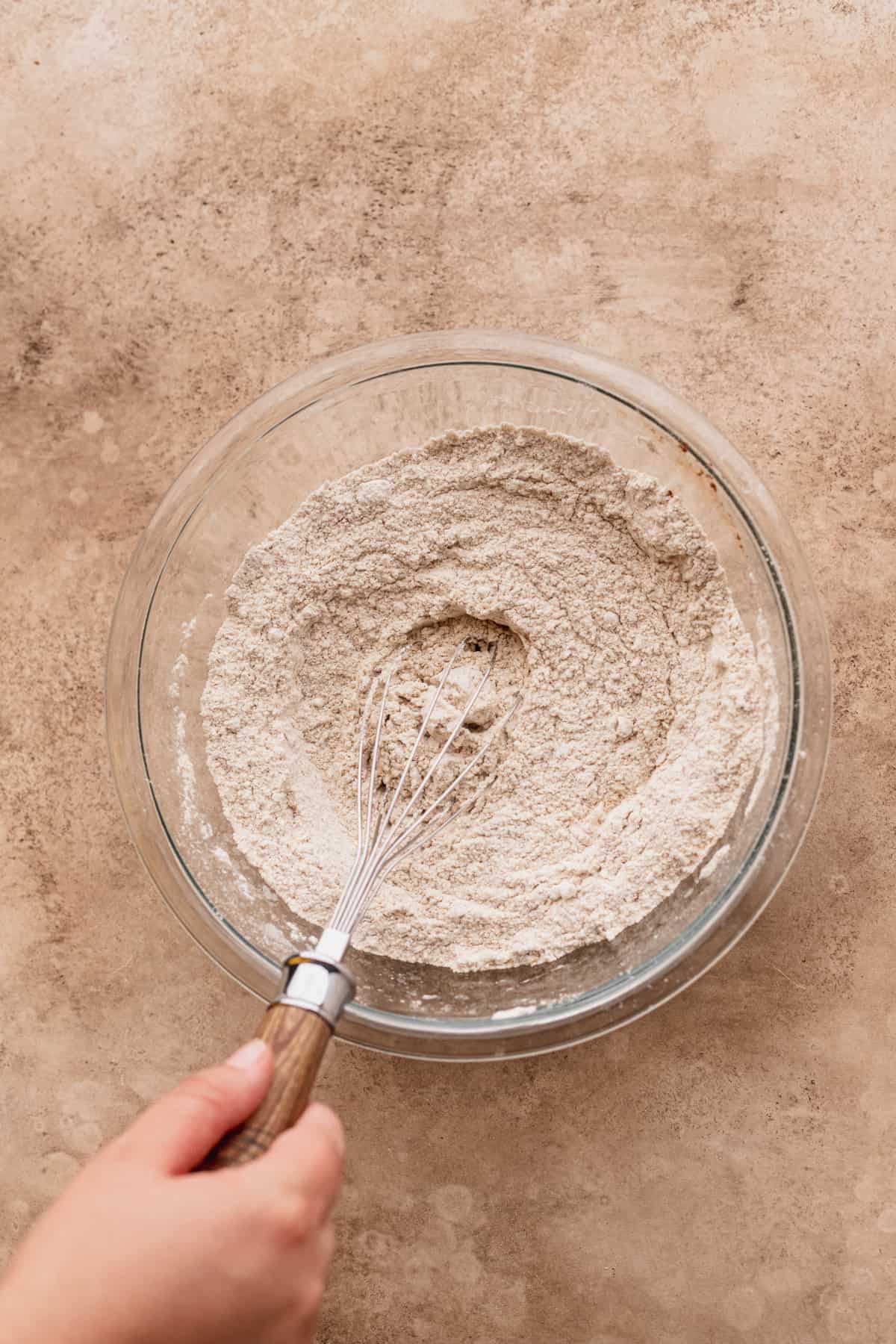 Dry ingredients in a glass bowl.