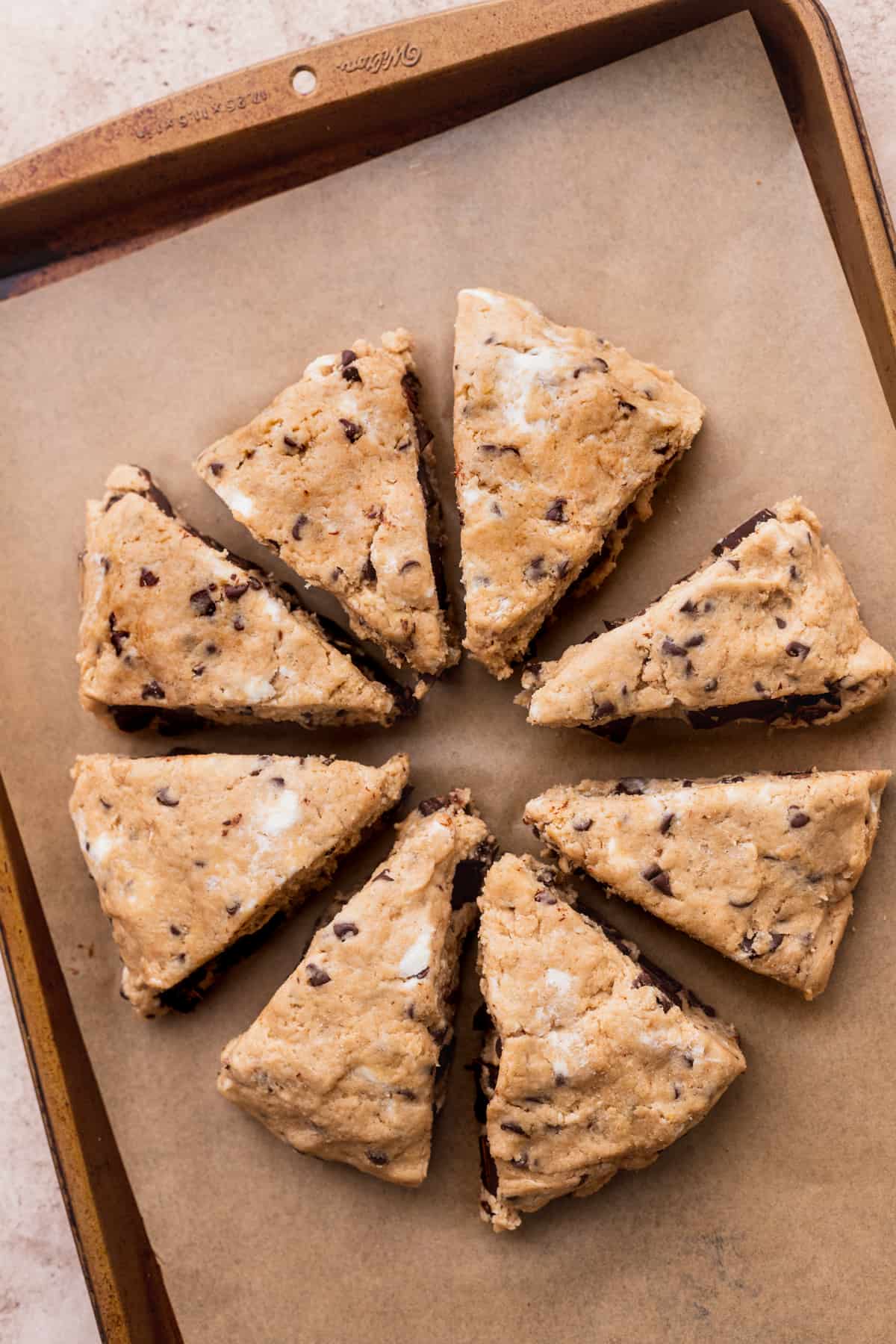 Scone dough cut into 8 pieces.