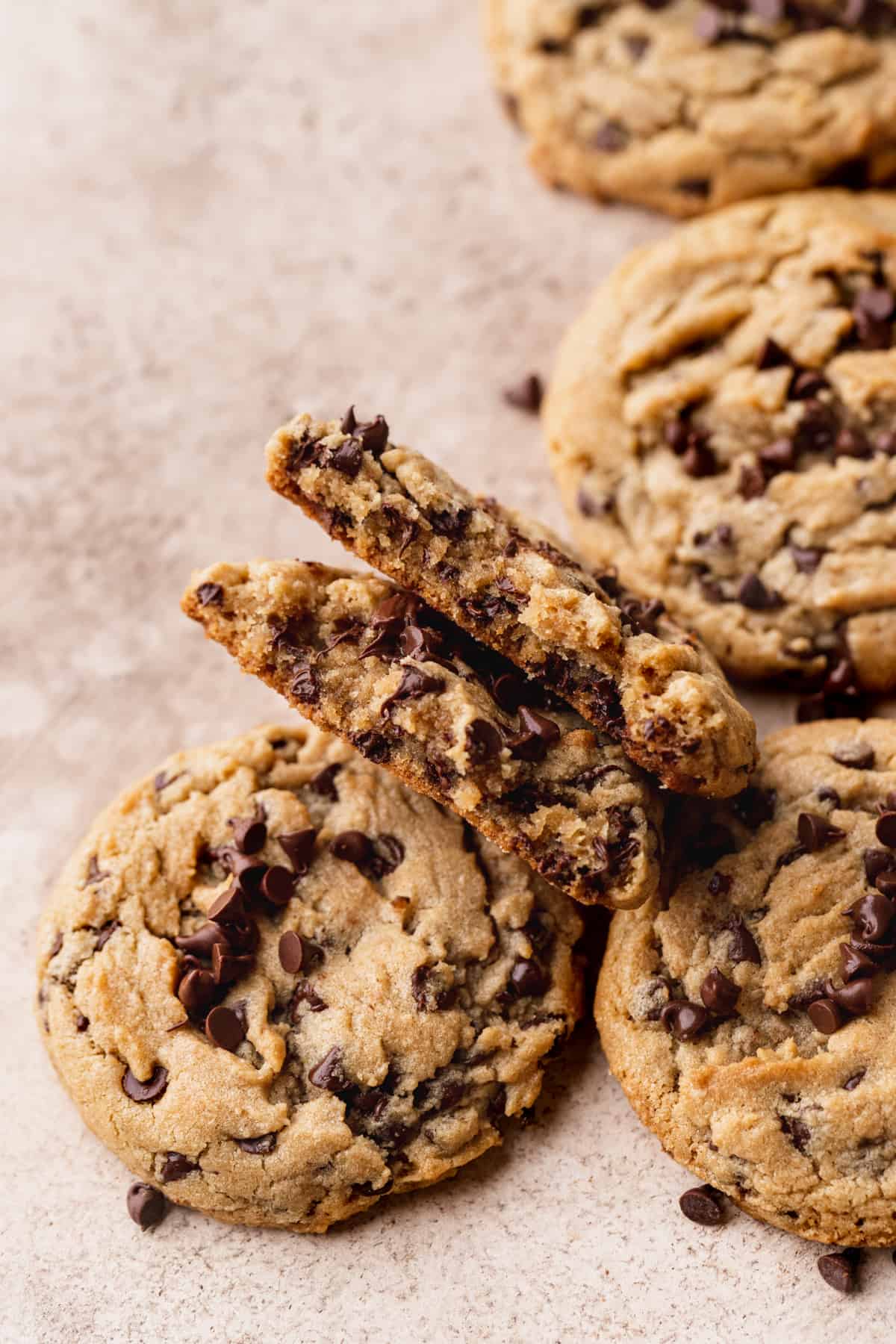 Peanut butter chocolate chip cookie split in half.