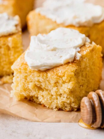Honey butter cornbread with butter on top.
