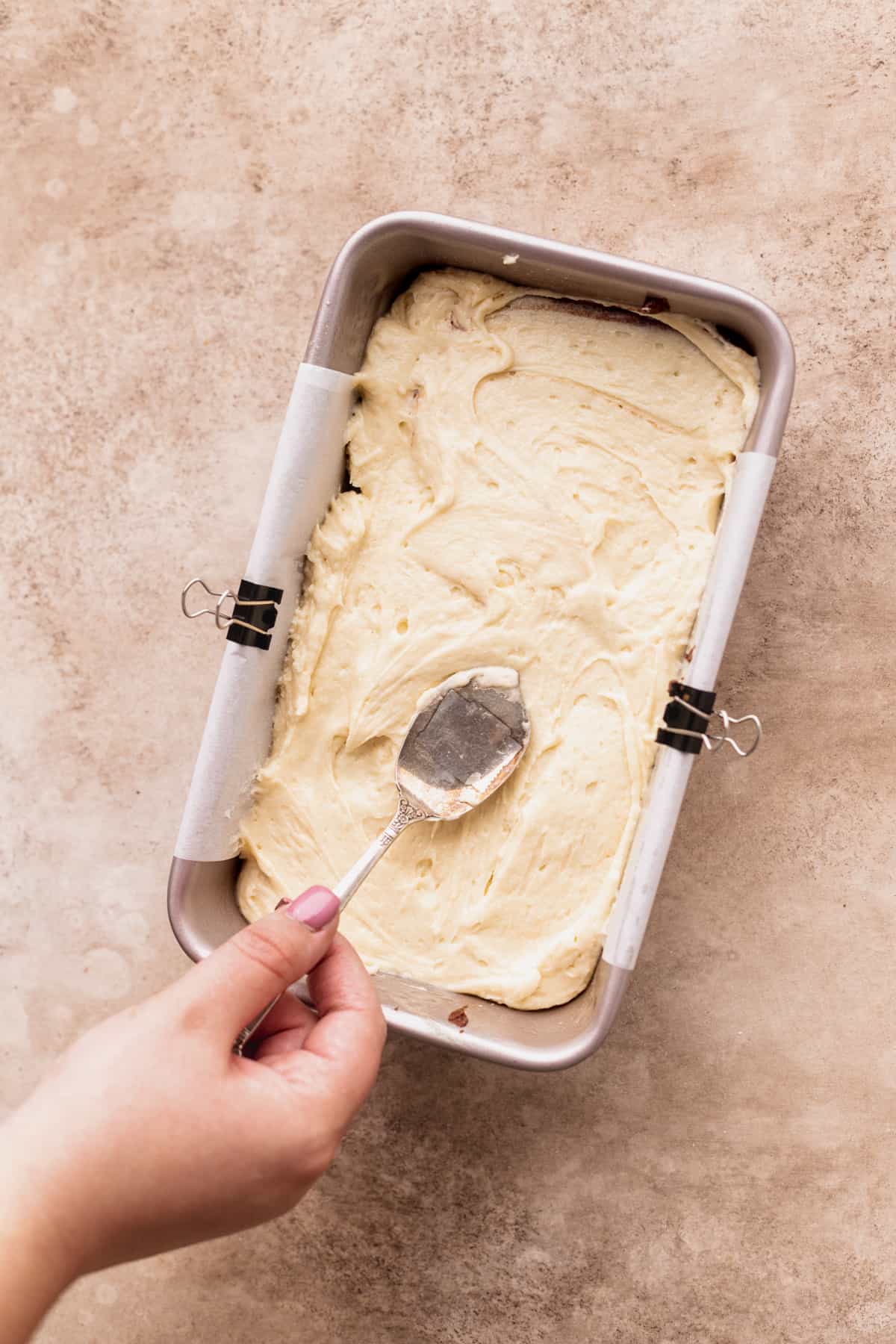 Smoothing out cake batter.