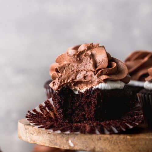 Bite missing from a hot chocolate cupcakes.