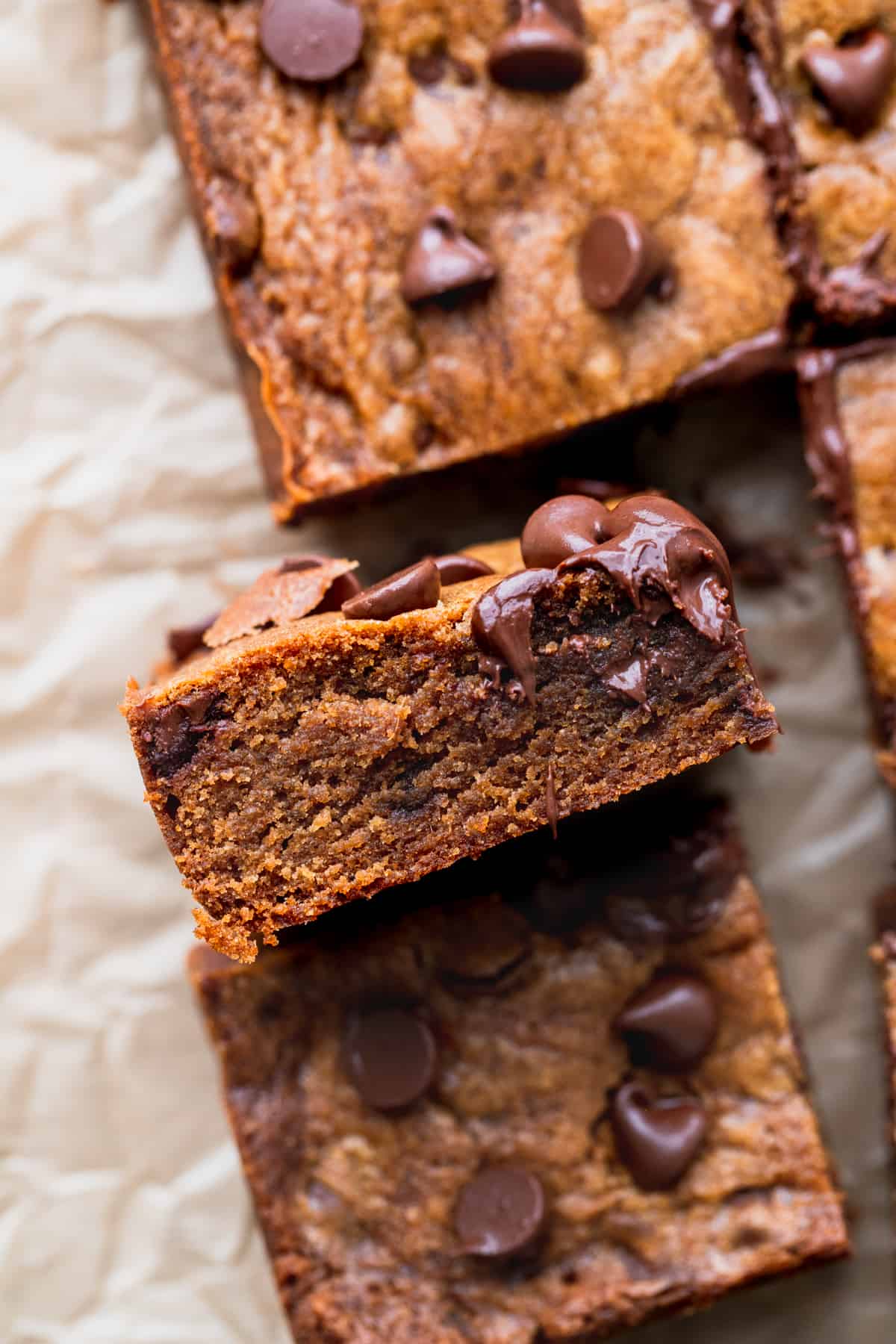 Gingerbread chocolate chip blondie on its side.
