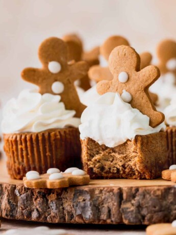 Bite missing from mini gingerbread cheesecakes.