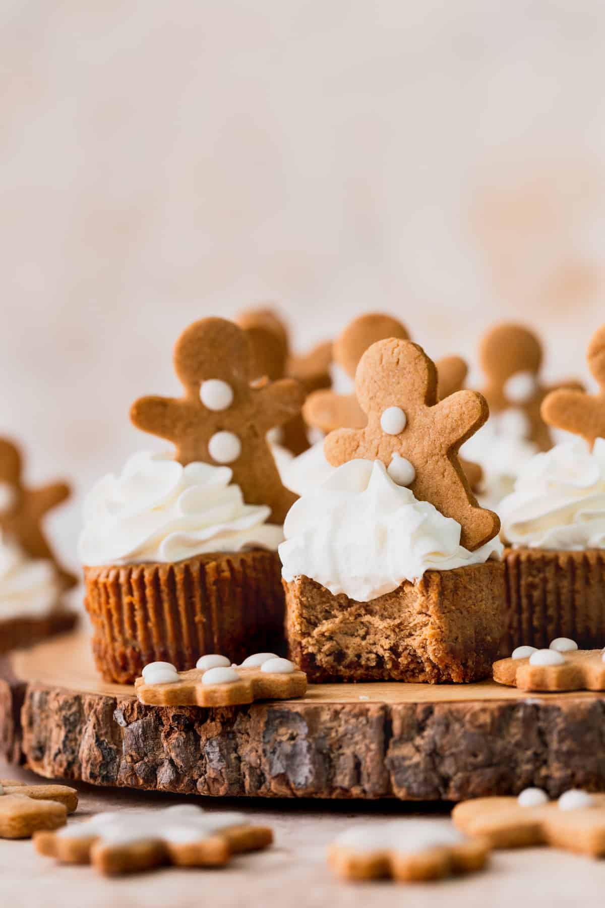 Bite missing from mini gingerbread cheesecakes.