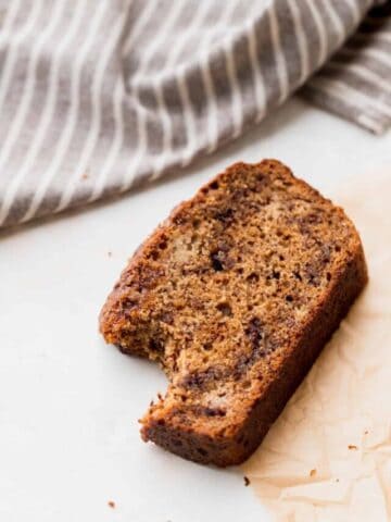 Bite missing from cinnamon swirl banana bread.