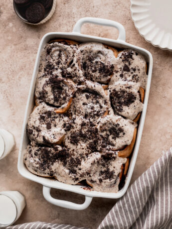 Oreo cinnamon rolls baked in a pan.