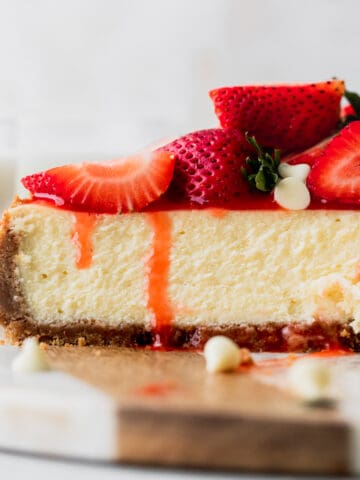 Side view of strawberry white chocolate cheesecake.