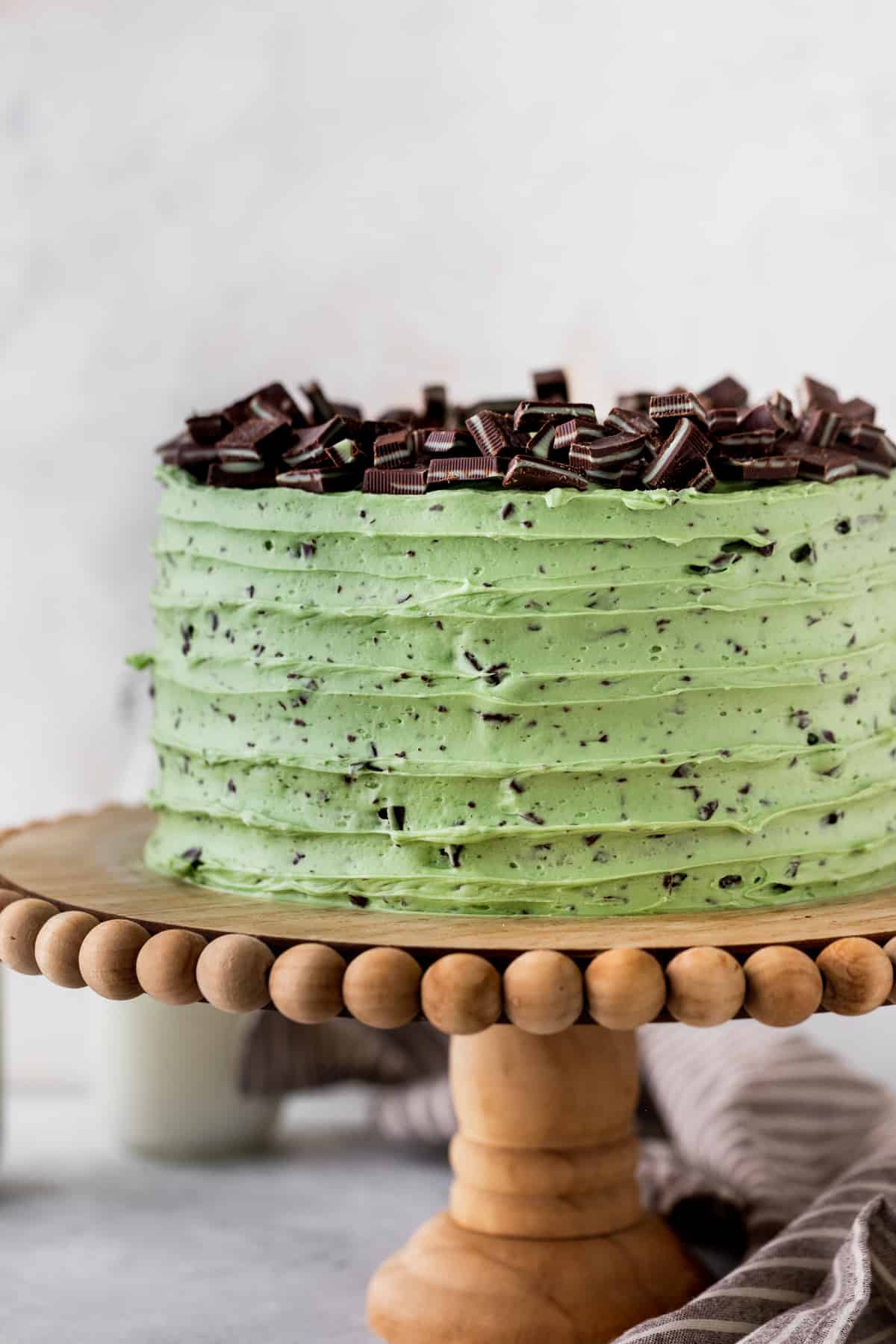Chocolate mint cake on a cake stand.
