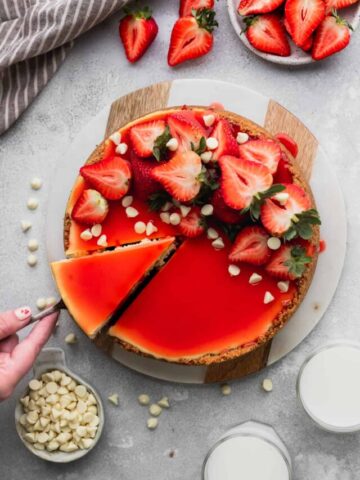 Pulling a slice out of cheesecake.