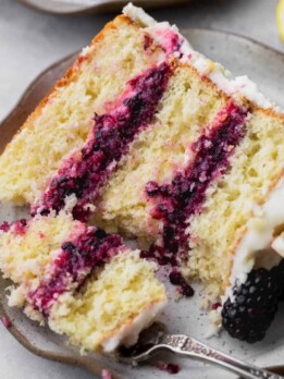 Taking a fork out of the lemon blackberry cake.