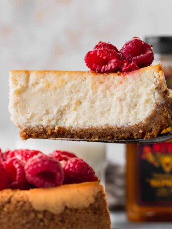 Pulling a slice out of the honey cheesecake.