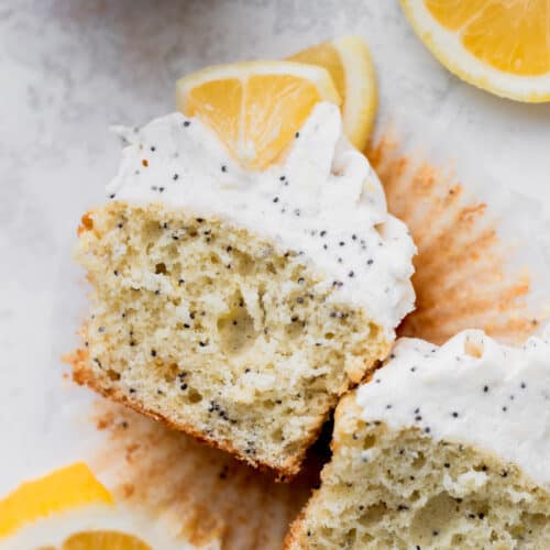 Lemon poppy seed cupcakes split in half.