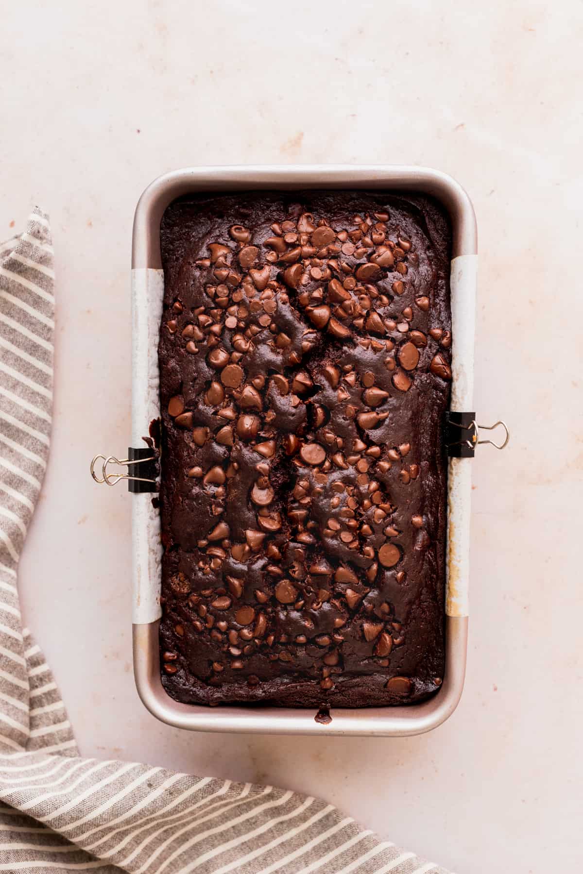 Baked banana bread in a loaf pan.