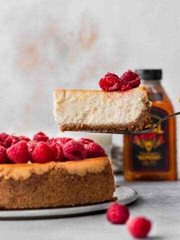 Pulling a slice out of the honey cheesecake.