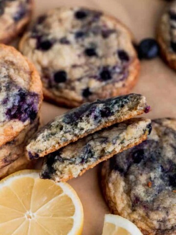A lemon blueberry cookie spilt in half.