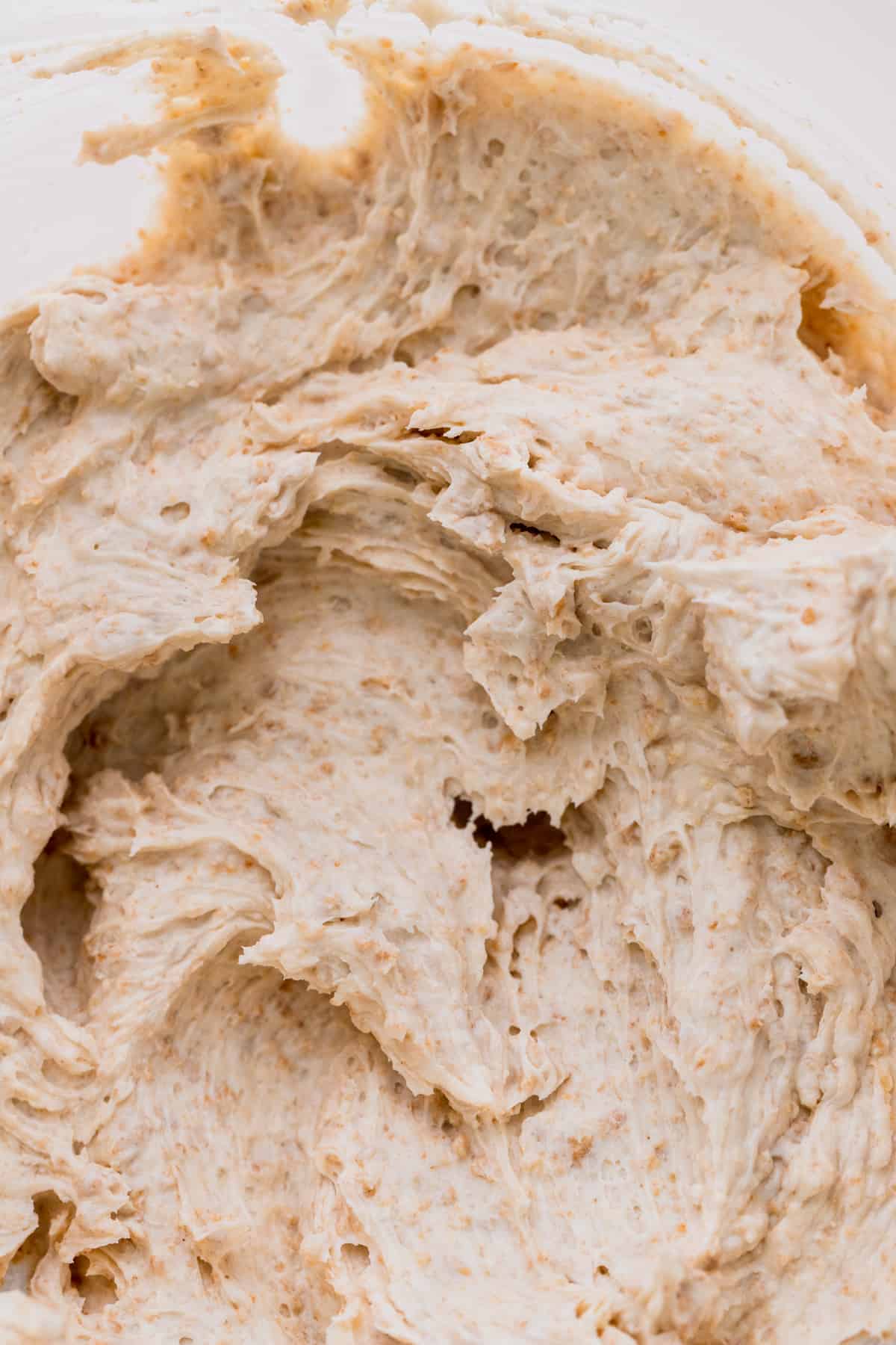 Close up of graham cracker cream cheese frosting.