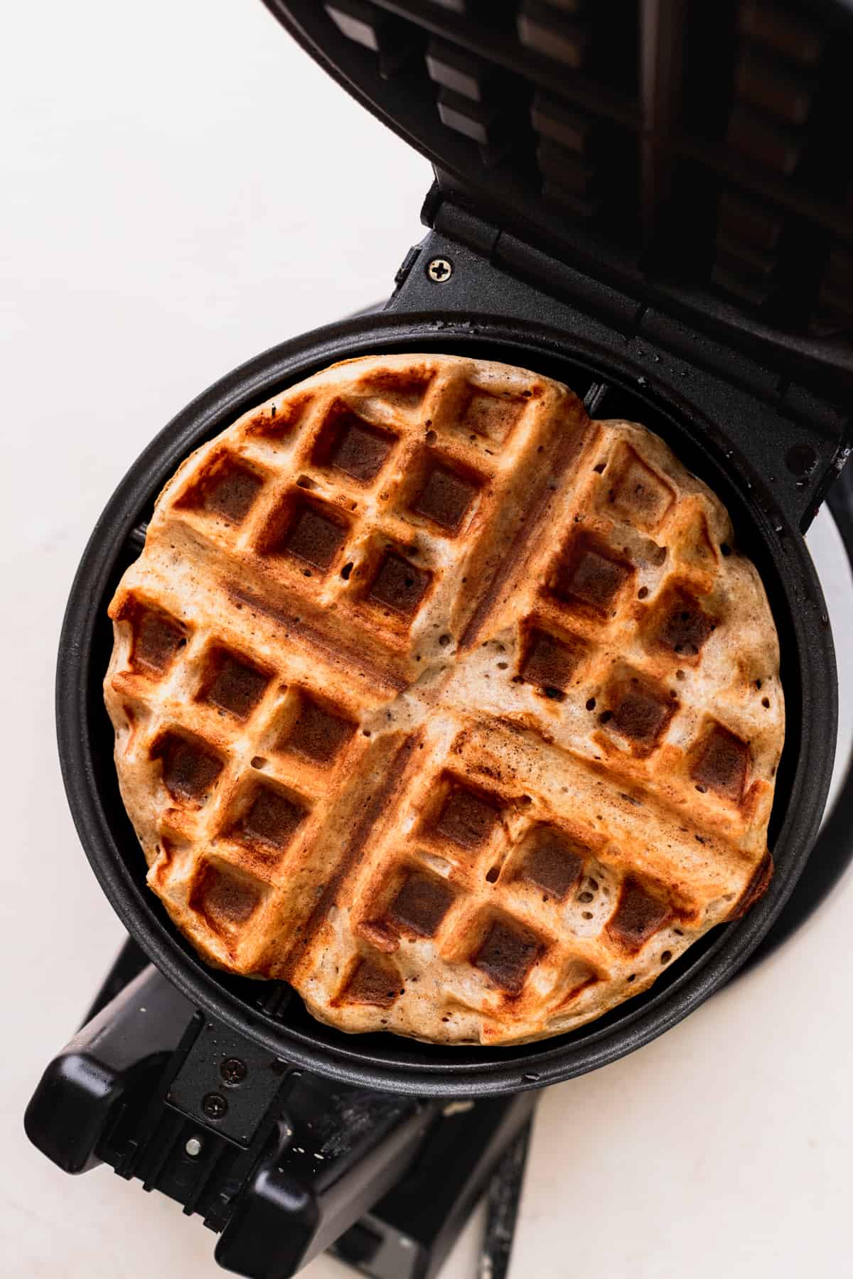 Baked waffle in the waffle batter.
