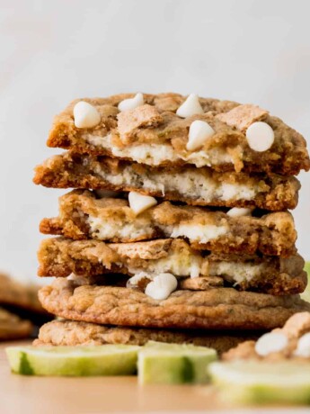 Key lime cookies stacked on top showing the filling.