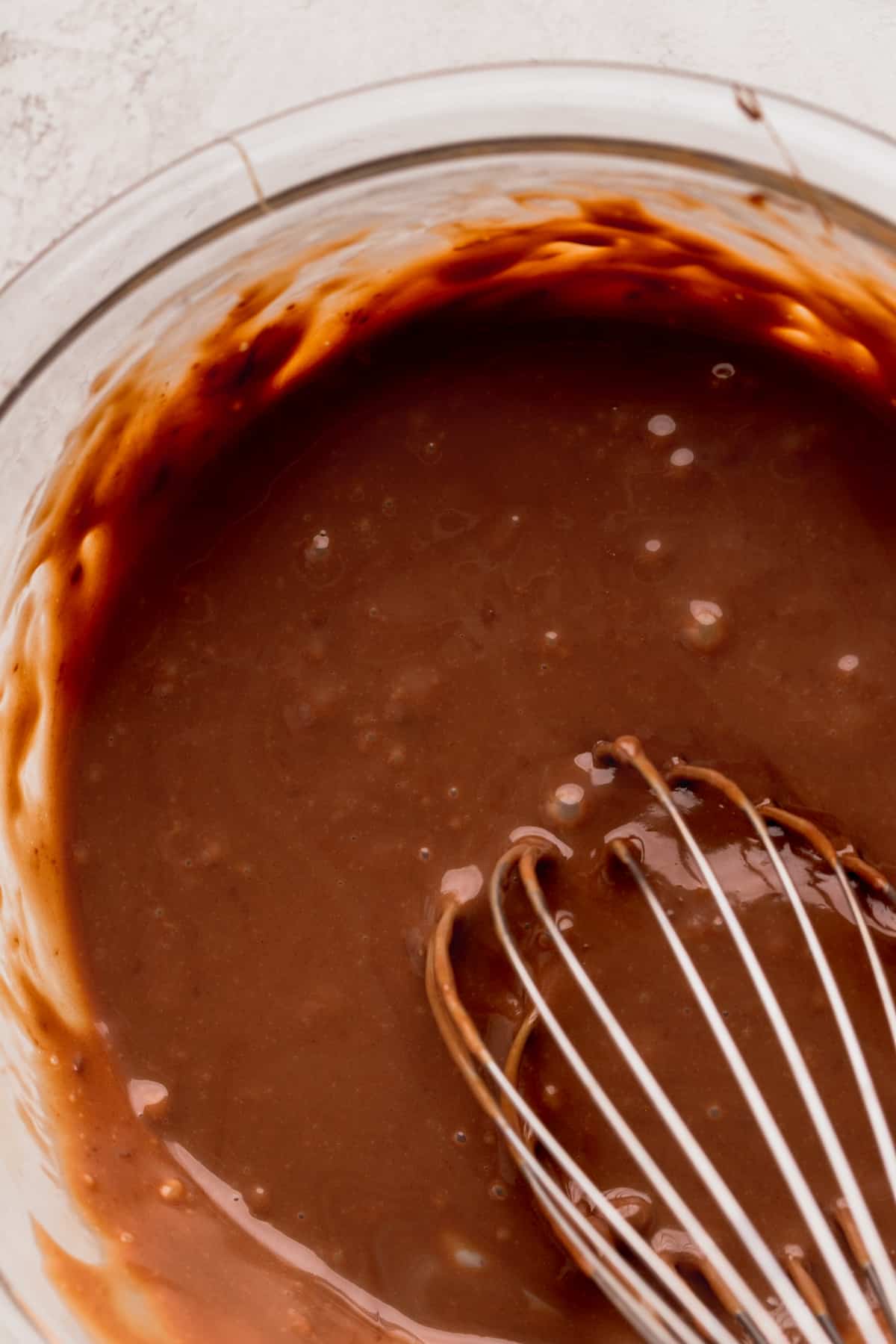 Nutella and sweetened condensed milk in a bowl.
