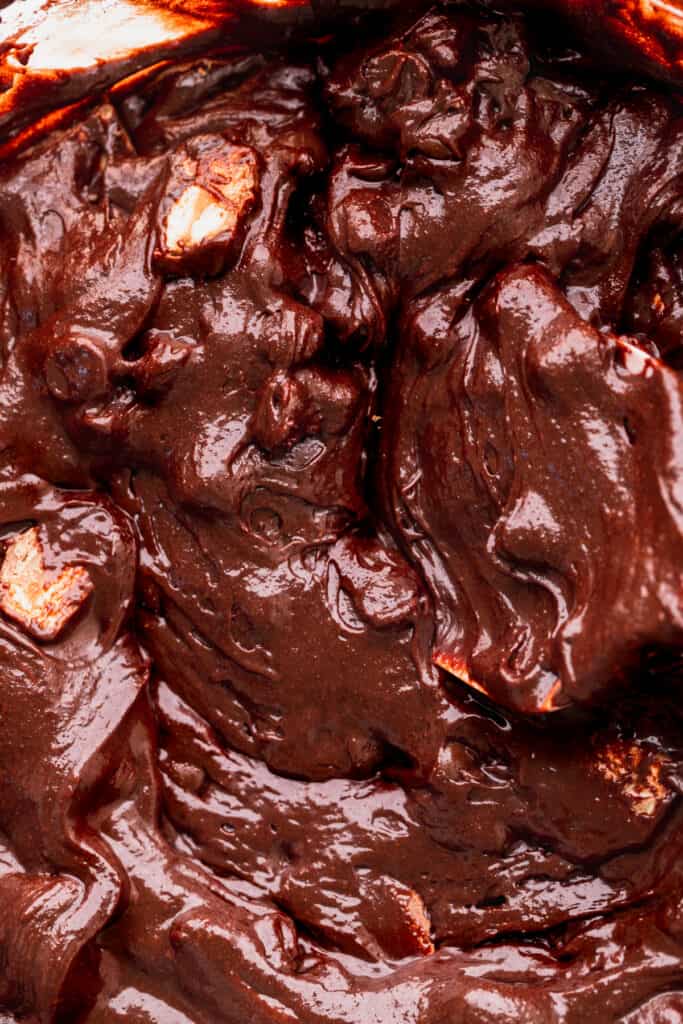 Brownie batter in a glass bowl.