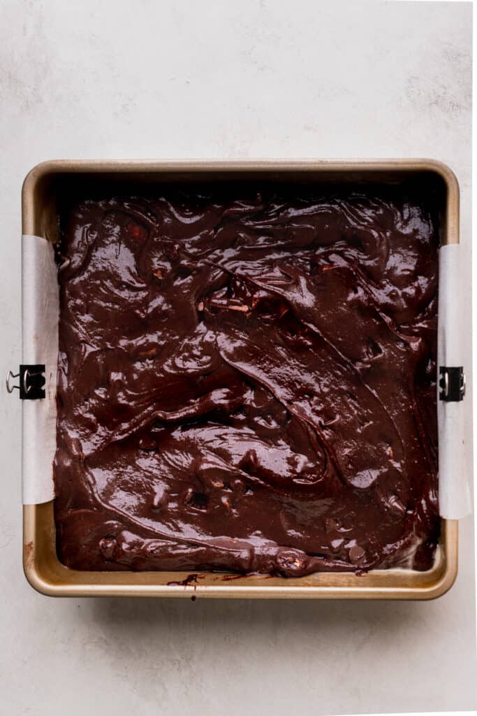 Brownie batter in the pan.