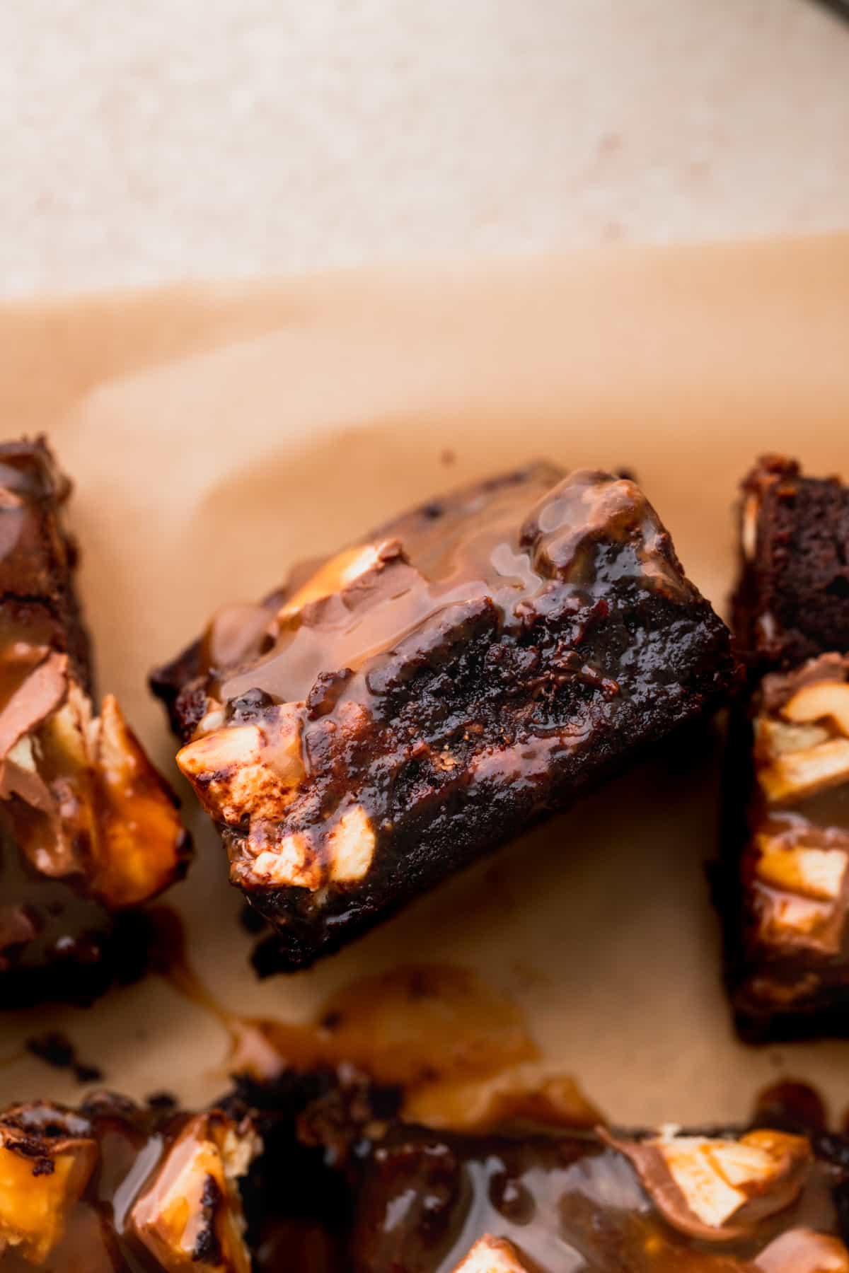 Side shot of Snickers brownie.