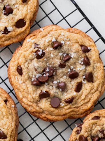 The best chocolate chip cookies on a wire rack.