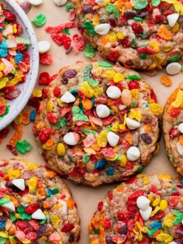 Fruity pebble cookies on a parchment paper.