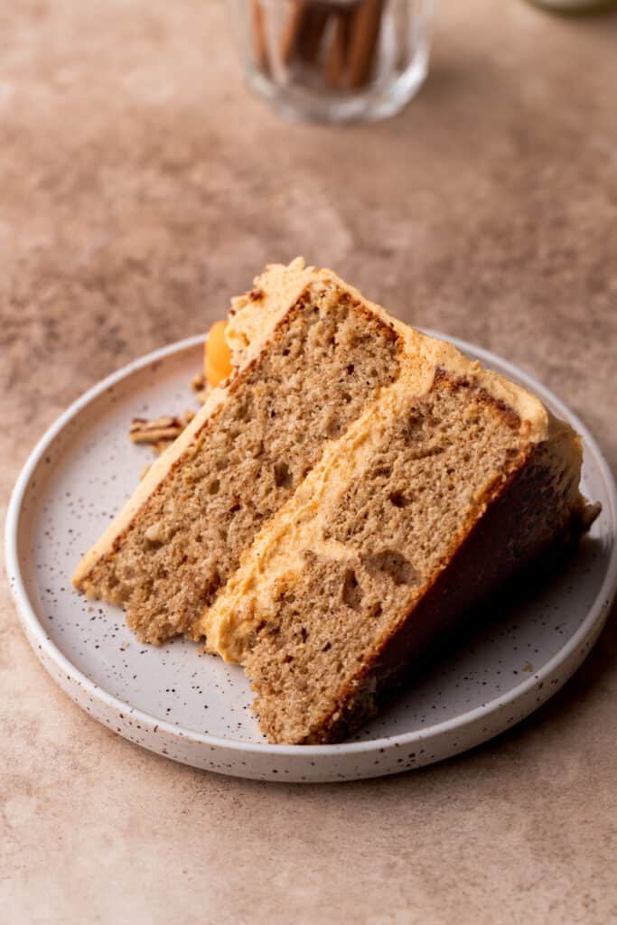 One slice of chai cake on a plate.