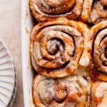 Caramel cinnamon rolls in a pan.