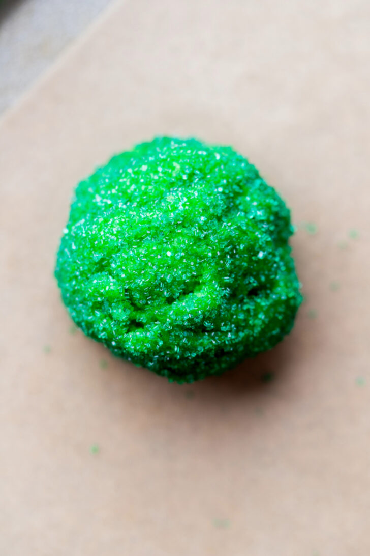 Cookie dough ball rolled in green sugar.