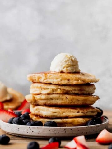 Stack of pancakes on a plate.