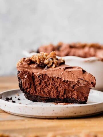 One slice of chocolate pie on a pie.