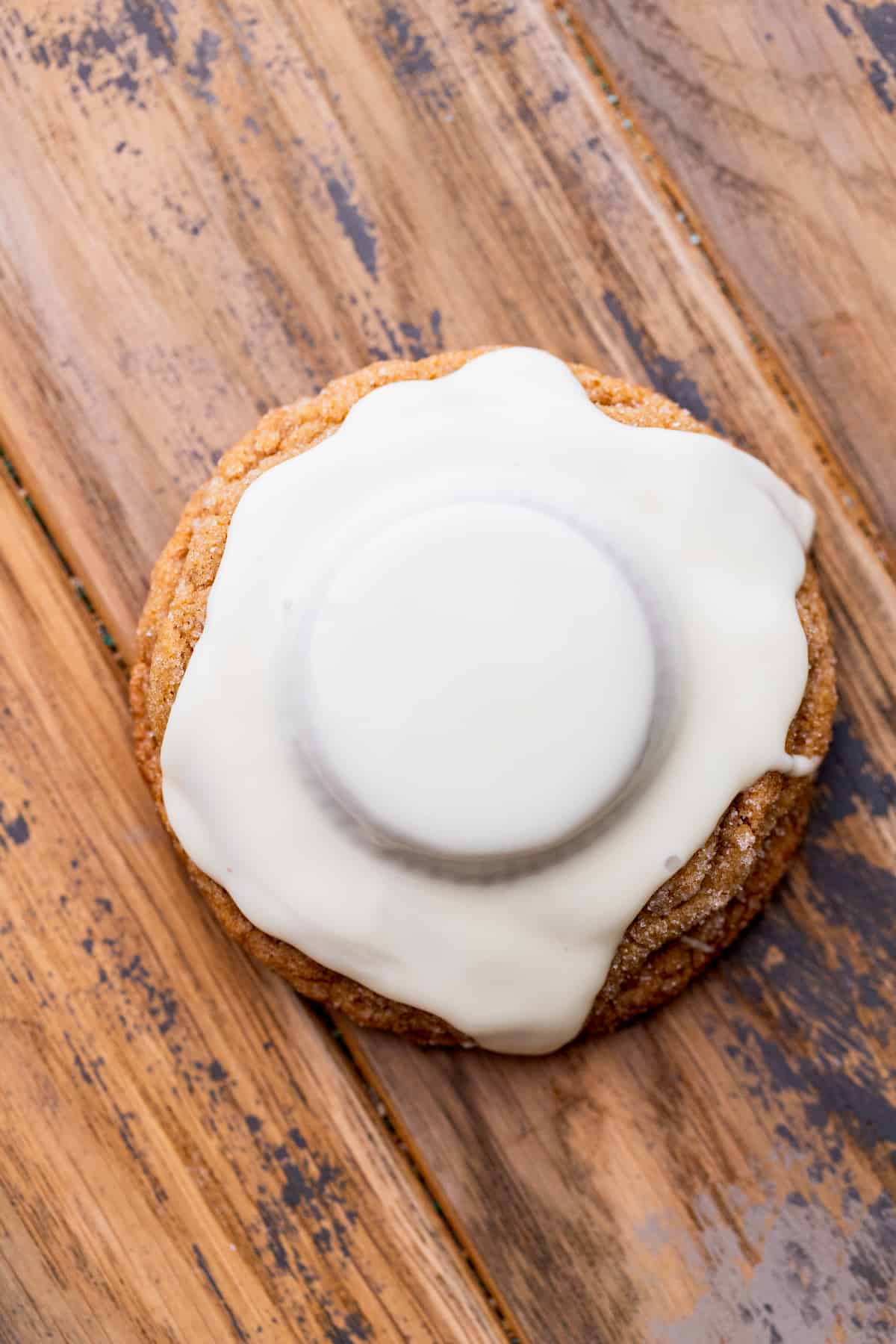 Melted white chocolate on top of cookie.