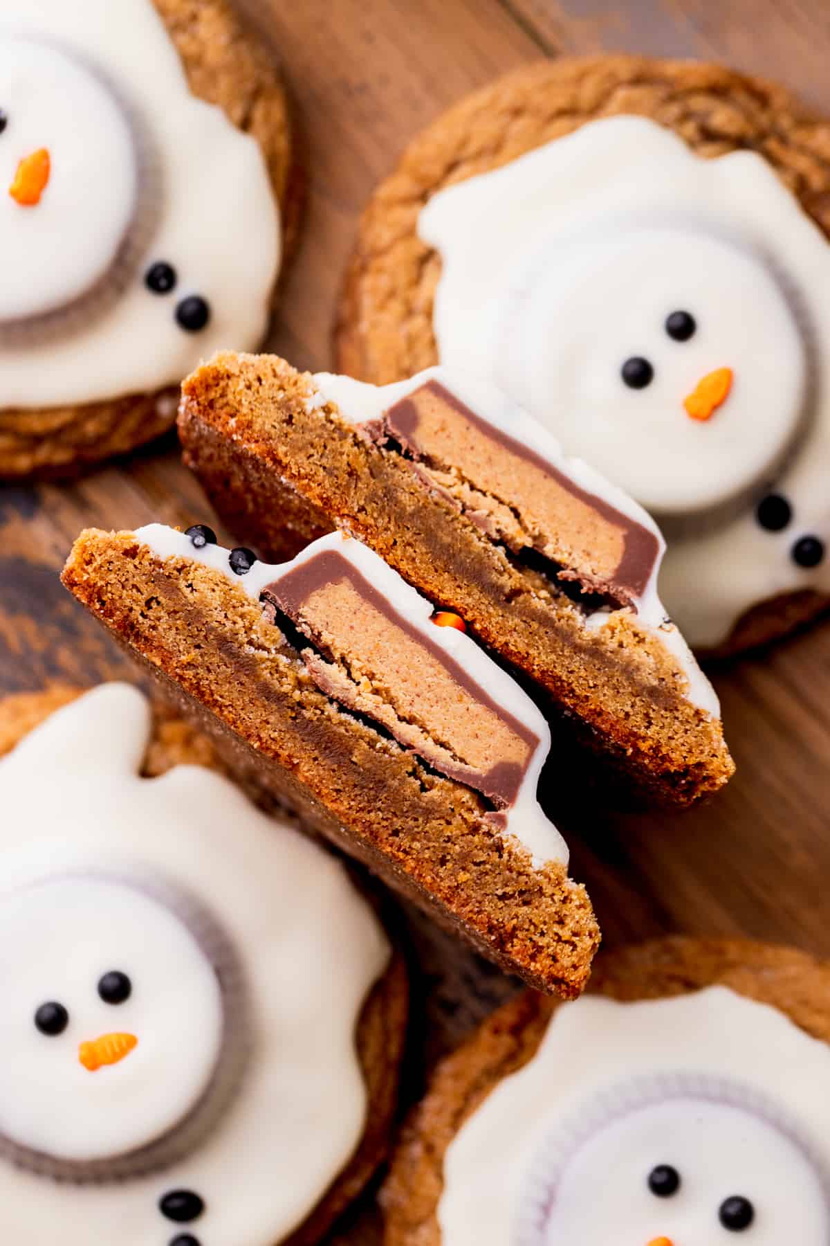 Snowman cookie cut in half to show the insides.