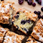 One piece of blueberry coffee cake on its side.