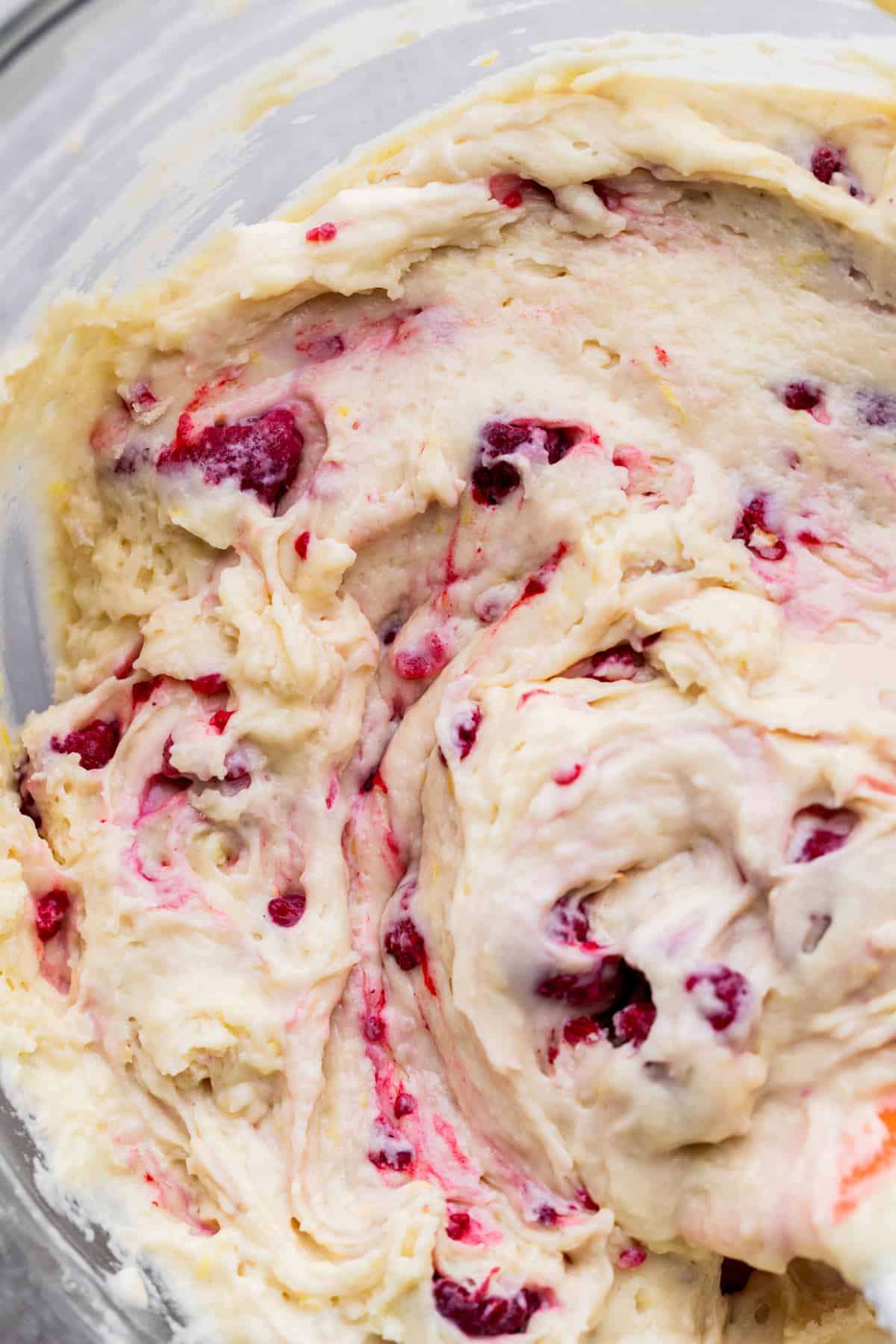 Muffin batter in a glass bowl.