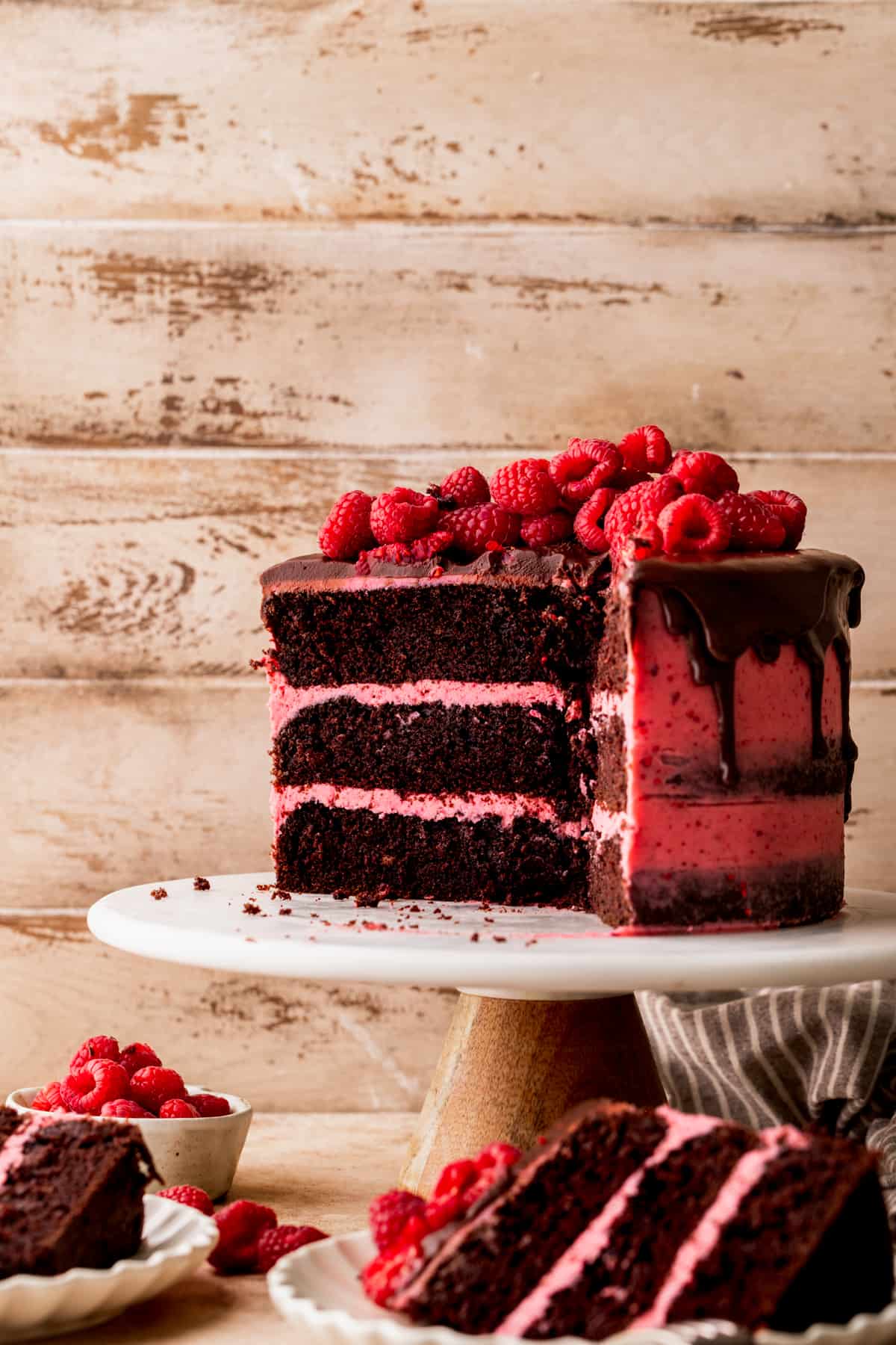 Chocolate raspberry cake cut in half.