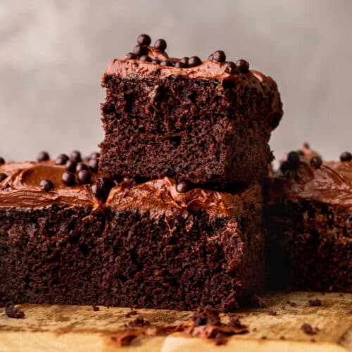 Stack of 2 chocolate ganache cake slices.Stack of 2 chocolate ganache cake slices.
