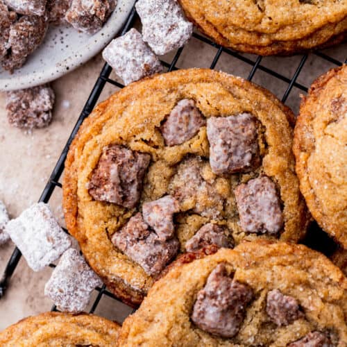 Muddy buddy cookies on a wire rack.