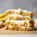 Stack of 2 lemon cookies split in half.